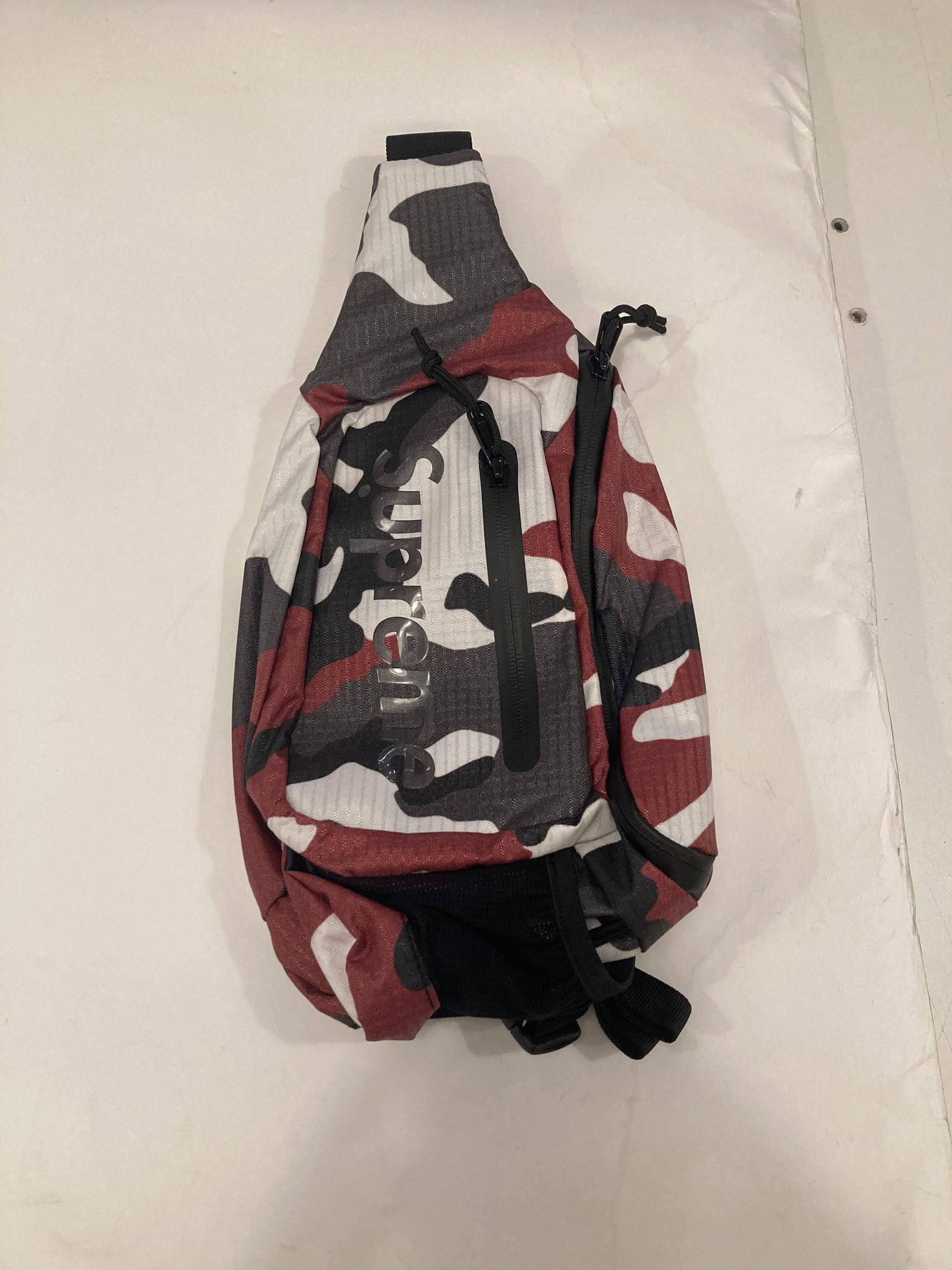 Supreme red camo sling bag 2024