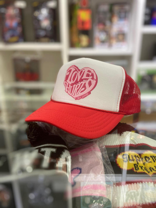 Love Hurts Trucker Hat Red