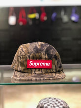 Load image into Gallery viewer, Supreme Military Camp Cap Mossy Oak Camo